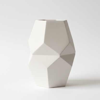 Handcrafted ceramic geometric vase, side angle view